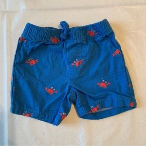 Baby Boys Blue trunks with red crabs. 3 months.